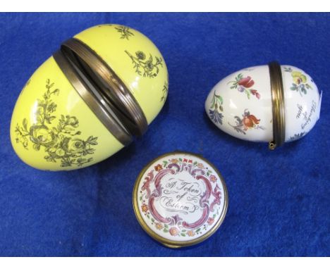 Three enamel cachou patch boxes, two of egg shape, one marked: Bilston and Battersea enamels and one marked: 'A Token of Este