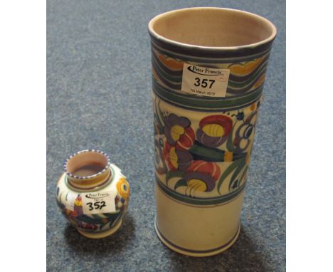 Poole Pottery hand painted floral cylinder vase together with a similar, smaller, baluster vase with terracotta bases marked: