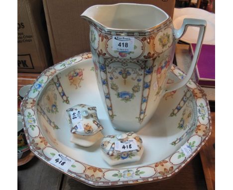 Early 20th Century Staffordshire transfer printed floral jug and basin set, together with two soap dishes and covers.(B.P. 24
