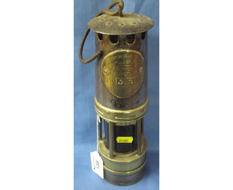Ackroyd and Best Limited Hailwood's improved miner's safety lamp with dark red lens, in used condition.(B.P. 24% incl. VAT) 