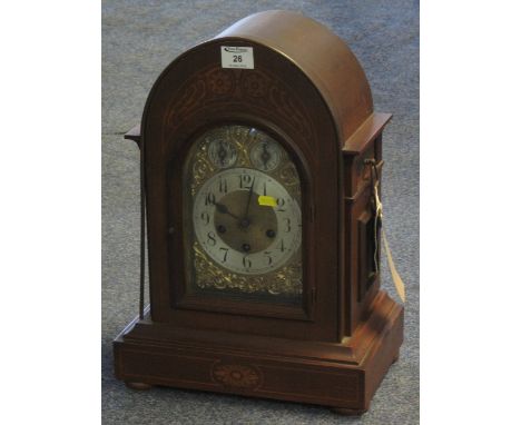 Edwardian inlaid mahogany three train, arch topped mantel clock with arched brass face, having gilded spandrels and Arabic st