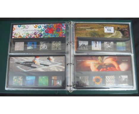 Great Britain Millennium issues for the year 2000, First Day Covers and presentation packs in green album.(B.P. 24% incl. VAT