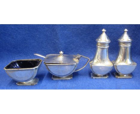 Four piece silver condiment set comprising: salt with blue glass liner; preserve pot and cover with spoon and pepperette, Bir