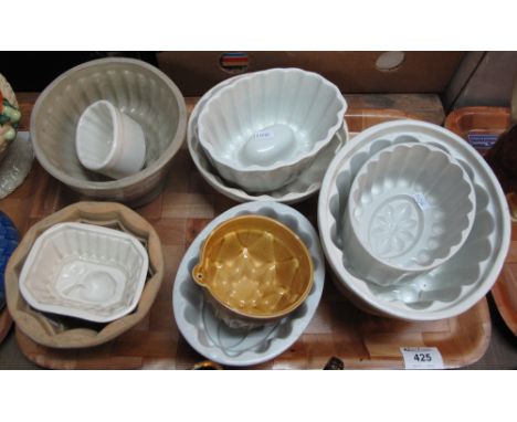 Tray of various ceramic jelly moulds, different designs including apple and flower petals etc.(B.P. 24% incl. VAT)