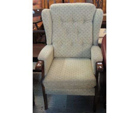 Modern upholstered button back wing armchair.(B.P. 24% incl. VAT)