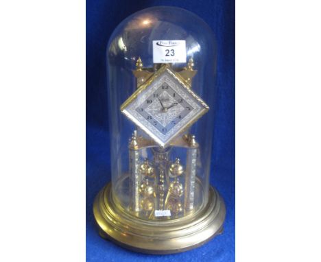 Kundo brass four hundred day perpetual motion dome clock, 30cm high, together with original instruction leaflet, repair bill 
