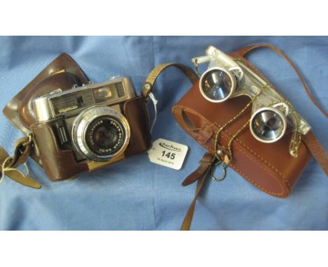Voigtlander 35mm viewfinder camera in Eveready case, together with a pair of binocular type spectacles in leather case. (2)(B