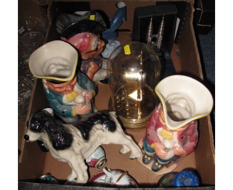 Tray of assorted items to include: pottery Toby jugs; china study of a spaniel; West German perpetual mantel clock etc.(B.P. 