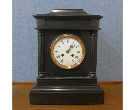 A 19th Century French Belge noir mantel clock 