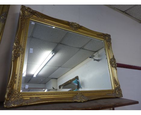 A Victorian style gilt framed mirror 