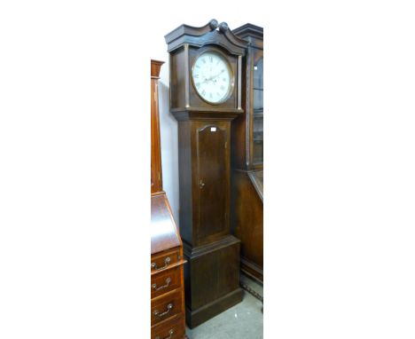 An oak 8-day longcase clock 