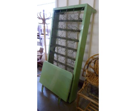 A vintage green painted steel single bed 
