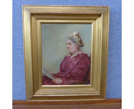 English School, portrait of a lady reading a book, oil on canvas, monogrammed G.H. and dated 1881, framed 