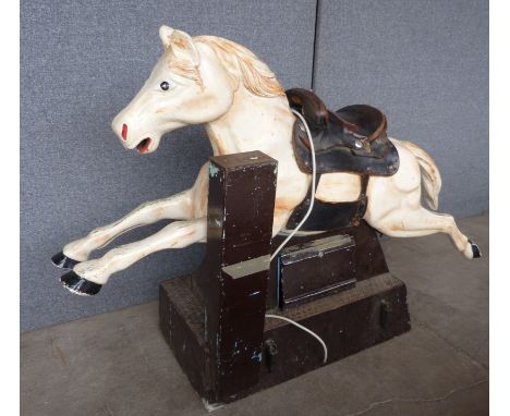 A vintage child's mechanical horse ride 