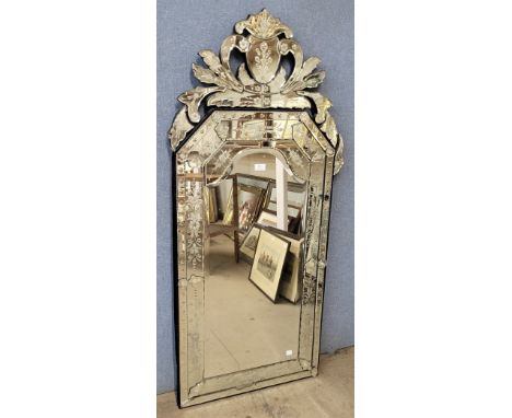 A large Venetian style mirror