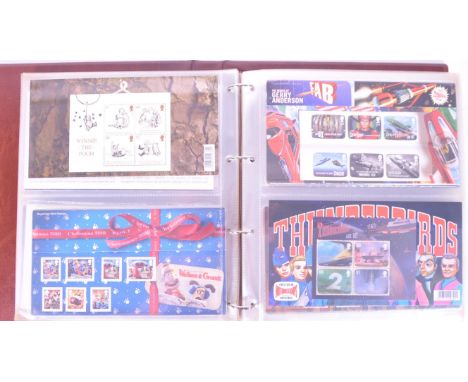 Collection of 21st century Royal Mail stamp presentation packs, including themes such as Mammals, Wallace and Gromit, Winnie 