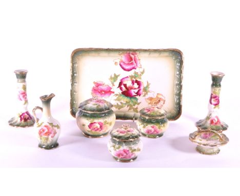 Collection of 19th century ceramic green and pink beauty set pieces, comprised of a tray, candlesticks, small jug, lidded pot