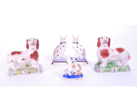 Collection of 19th century ceramic fireside mantel Staffordshire animal figures. Consisting of a pair of Spaniel dogs, pair o