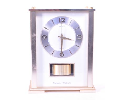 Seiko - A vintage 20th century Seiko Westminster Wittington metal cased mantle clock. The clock having a brass tone brushed m