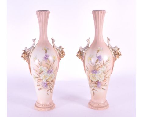 Rudolstadt - Two early 20th century twin handled bisque porcelain vases in a beige colourway with hand painted flowers decora
