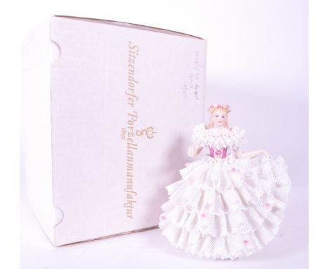Sitzendorfer Porzellanmanufaktur - 20th century German bisque porcelain dancer lady figure. Featured in a white lace dress en
