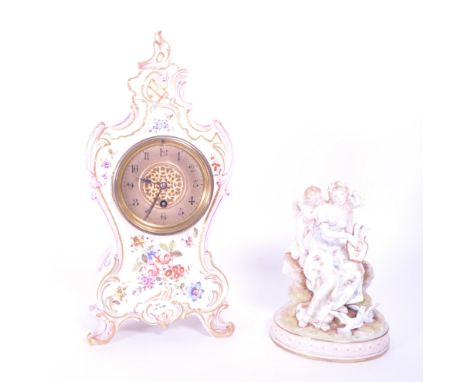Early 20th century Karl Ens German porcelain classical figure of a woman playing a lute with a cherub raised upon an oval pli