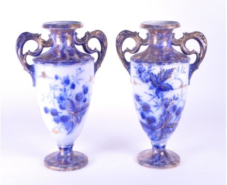 Thomas Forester &amp; Sons Ltd - Early 20th century ceramic twin handled vases. In a blue and white patterned design with gil