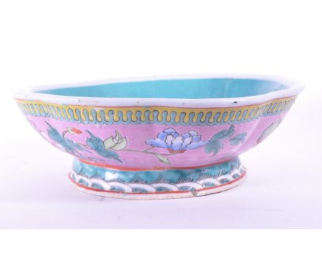 Vintage 20th century Chinese Famille rose pottery footed dish decorated with an inner blue glaze and a more ornate pink, yell