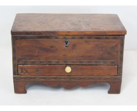 Small 19th century fruit wood box of rectangular form with inlaid diamond banding and stringing, bracket feet with shaped apr
