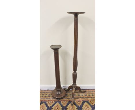 19th century mahogany fluted column torchere on tripod base and another smaller (2) 