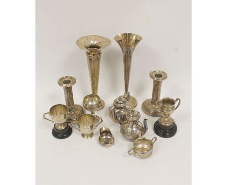 E.p.b.m. toy coffee and tea set, two silver vases, a pair of similar candlesticks, loaded, four small cups and a salt.