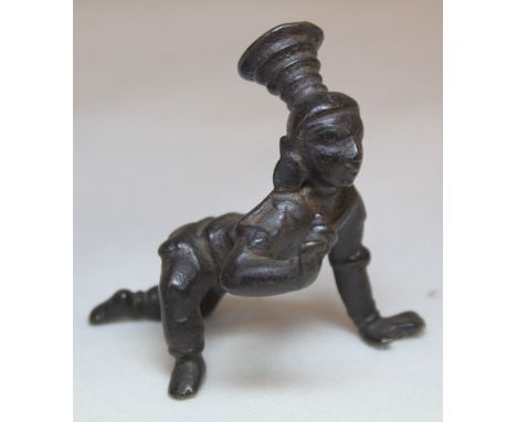 Antique small bronze figure of Bala Krishna, 7.5cm high.