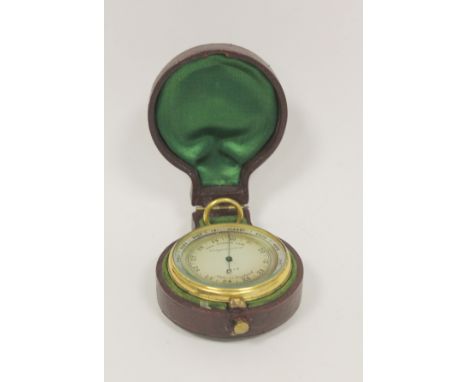 Early 20th century aneroid barometer with altimeter in leather case.