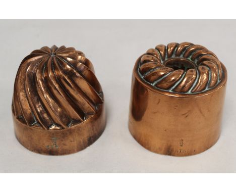Two Benham & Froud copper jelly or cake moulds, one of spiral fluted domed form no. 436, 10.5cm diam., the other of cylindric