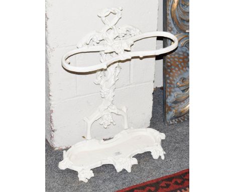 A white painted cast iron two-division stick stand, cast with grapes and vines, 62cm high 