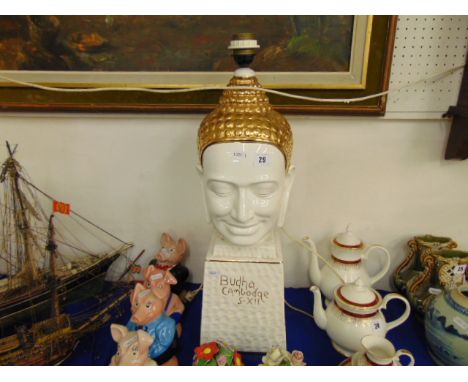 A porcelain Buddha lamp