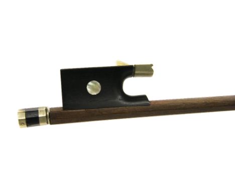 French nickel mounted violin bow possibly by Francois Bazin, unstamped, the stick round, the ebony frog inlaid with pearl eye