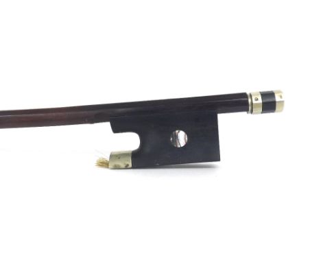 French nickel mounted violin bow of the Maire Workshop, the stick round, the ebony frog inlaid with pearl eyes and the ebony 