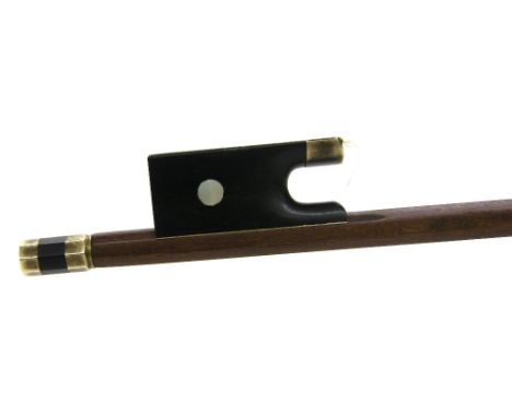 Silver mounted violin bow stamped L. Morizot, the stick round, the ebony frog inlaid with pearl eyes and the ebony adjuster w