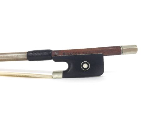 French nickel mounted violin bow stamped Poirson á Paris, the stick round, the ebony frog inlaid with nickel rings enclosing 