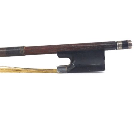 Interesting old silver mounted self-rehairing violin bow, faintly stamped 'J.B Vuillaume', the stick round, the ebony frog pl