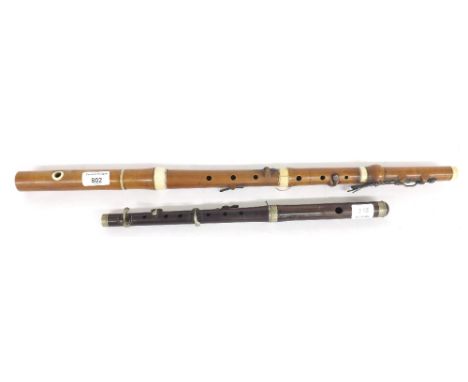 19th century English boxwood and ivory mounted six keyed flute by and stamped Goulding & Co (at fault); together with a rosew