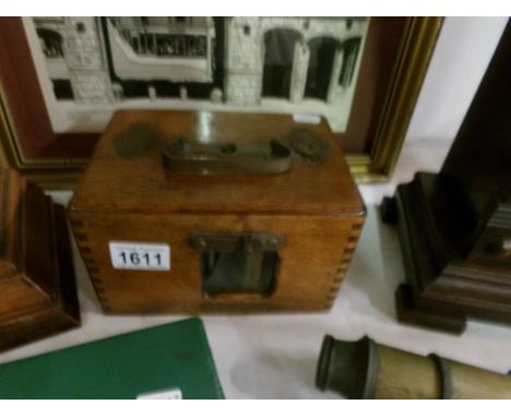 An oak cased Jundes-Thexor timing clock