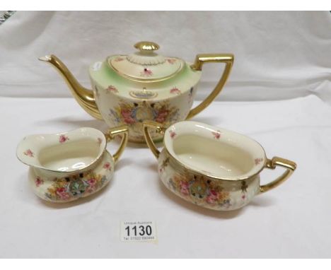 A 3 piece Crown Devon 'Queen Anne' tea service