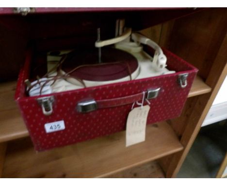 An early 1960's record player, in working order but needs servicing