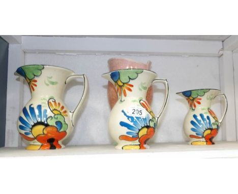 A set of 3 graduated Beswick jugs (1 a/f on foot) and a Sylvac Deco vase