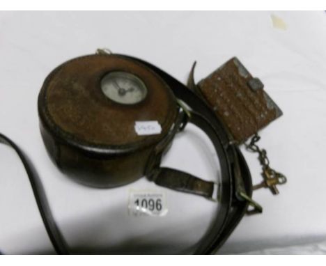 The Watchman's 'Tell Tale' clock with keys and wall attachment