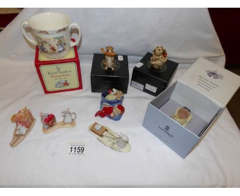 A Royal Doulton Bunnikins loving cup, A Wade figure and other figures including Lladro and Fragile World