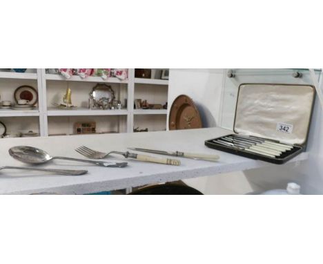 A cased set of butter knives, 2 serving spoons, fish fork with silver collar etc