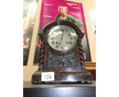 An oak mantel clock
